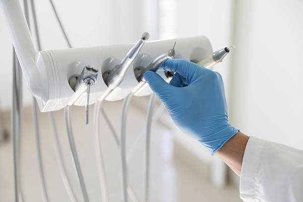 Professional Tooth Extraction technician working in Union County County, FL